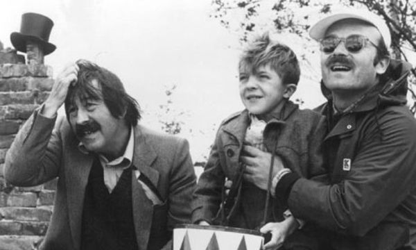  Günter Grass with David Bennent and Volker Schlöndorff on the set of The Tin Drum